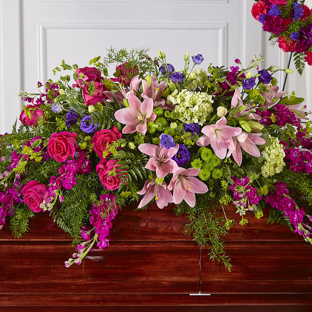 Radiant Tribute Casket Spray – Blooming Branches, Guttenberg IA
