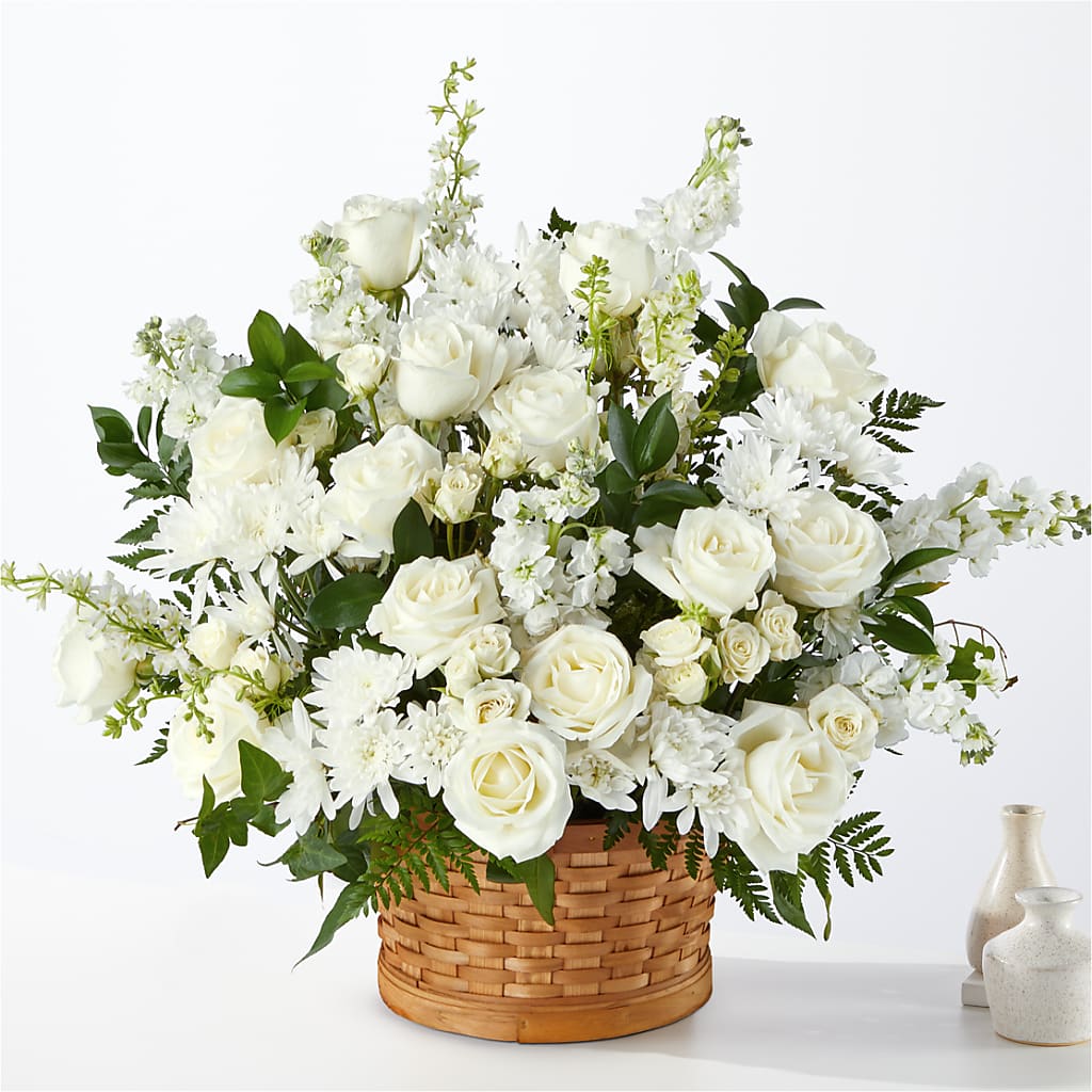 Heartfelt Condolences Arrangement – Blooming Branches, Guttenberg IA